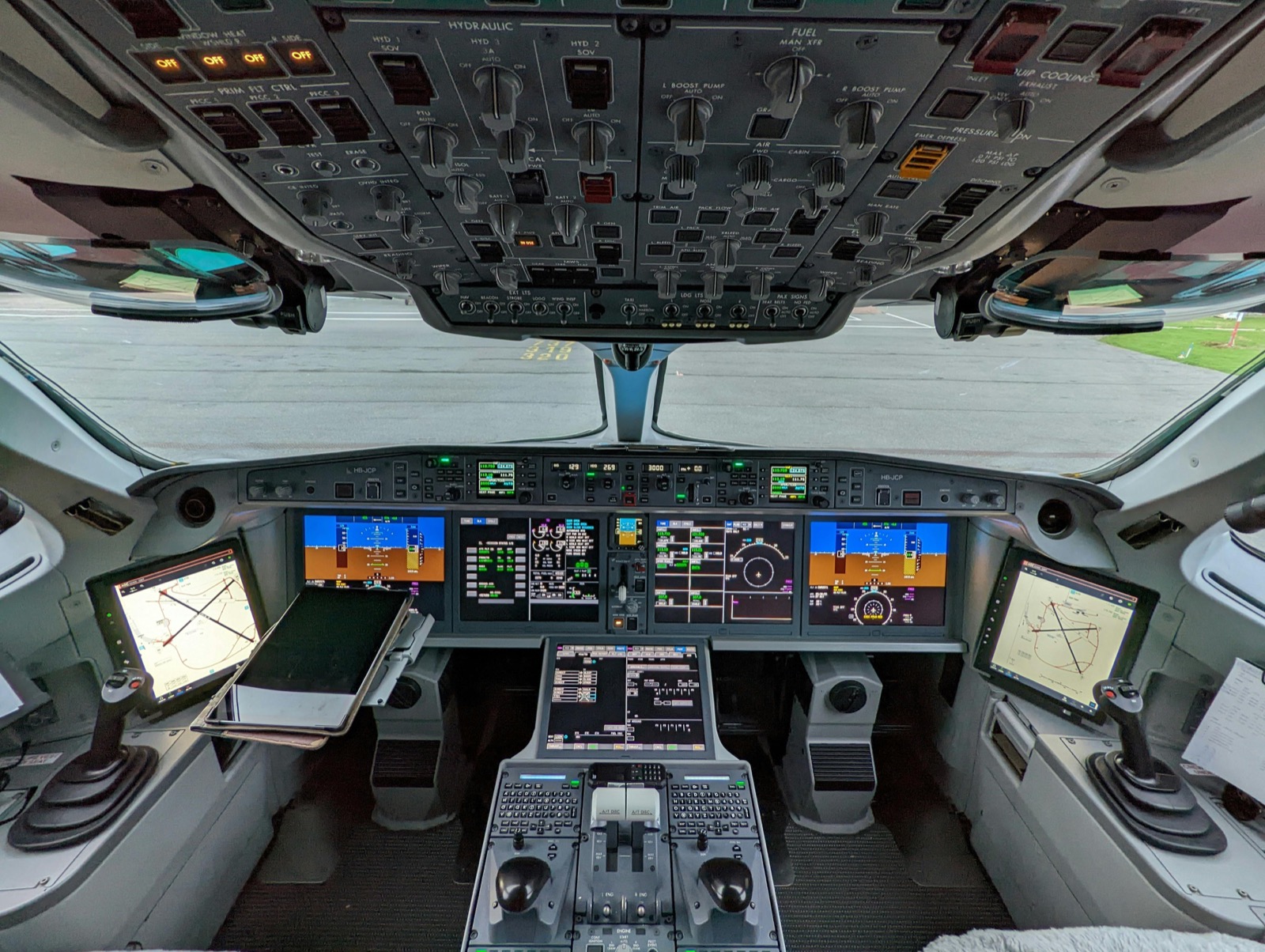 Advanced aerospace cockpit with modern avionics systems
